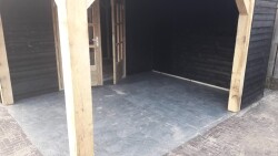 renovatie achtertuin met tuinhuis